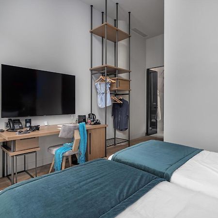 Hellenic Vibes Smart Hotel Aten Exteriör bild A room at the hotel