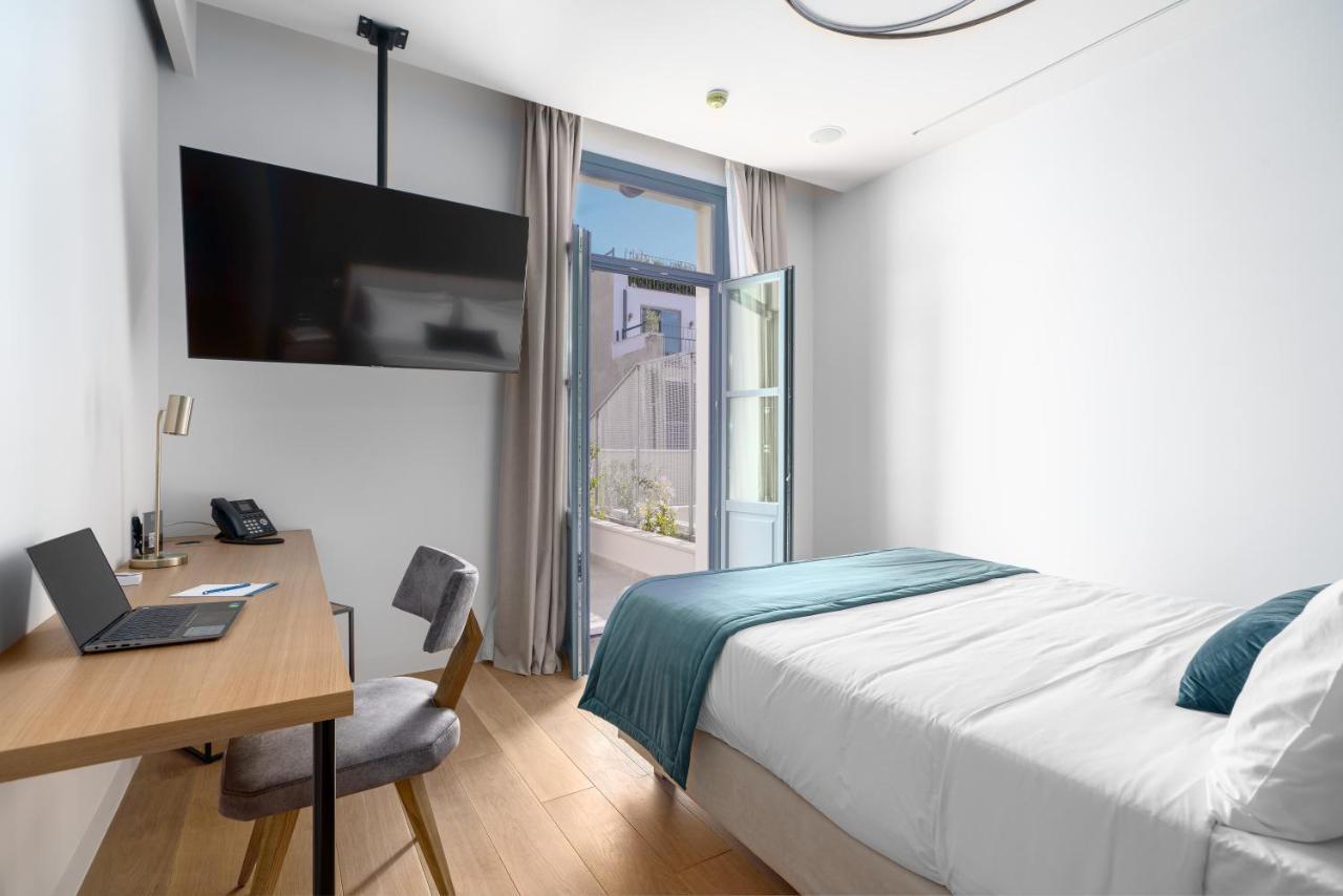 Hellenic Vibes Smart Hotel Aten Exteriör bild A room at the hotel