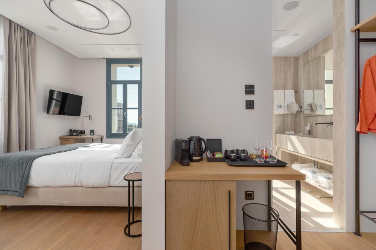 Hellenic Vibes Smart Hotel Aten Exteriör bild A room at the hotel