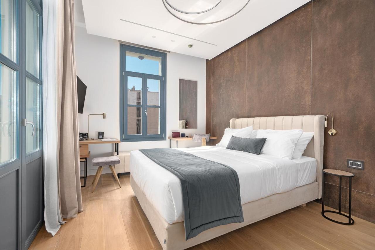 Hellenic Vibes Smart Hotel Aten Exteriör bild A bedroom at the hotel