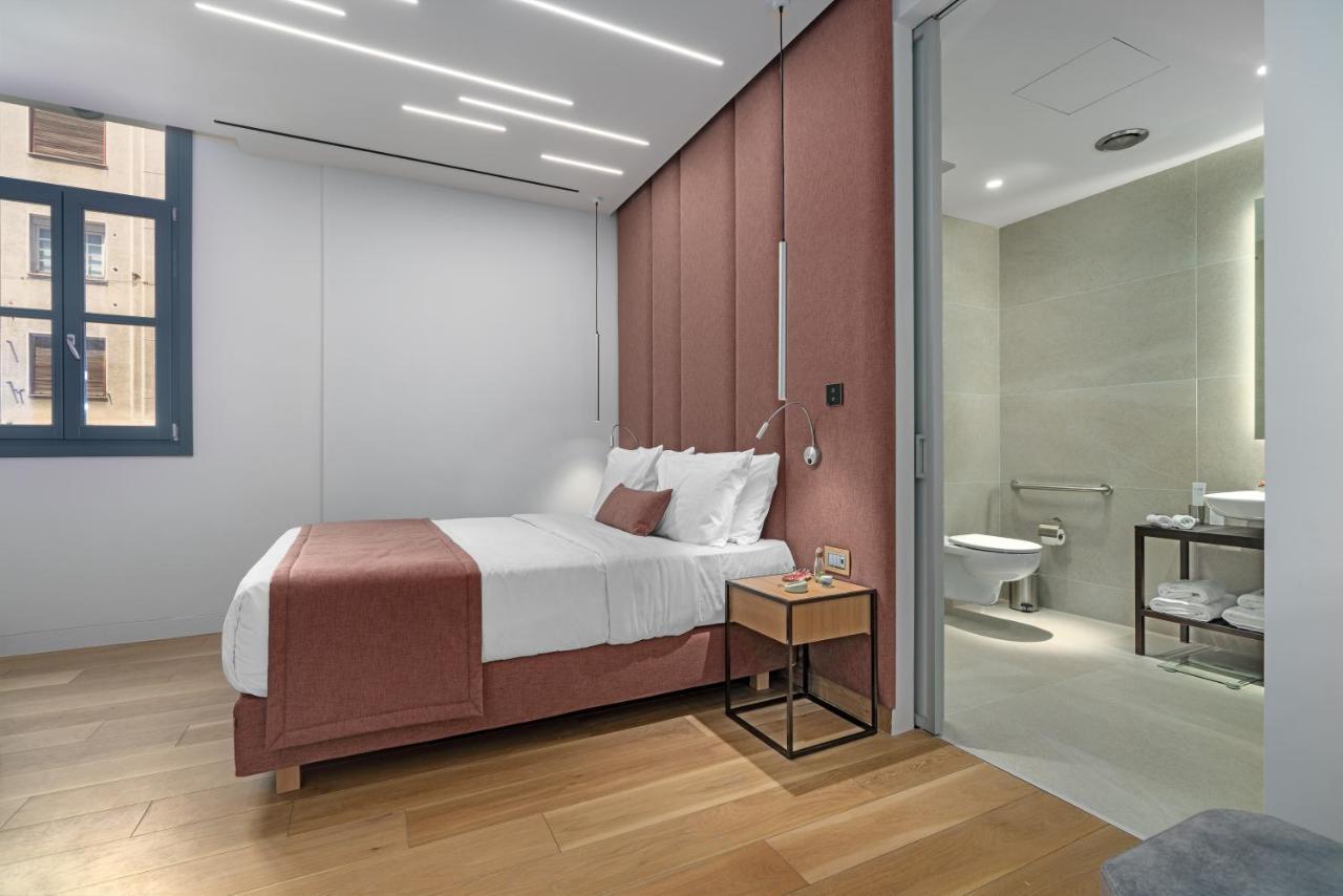 Hellenic Vibes Smart Hotel Aten Exteriör bild A bedroom at the hotel